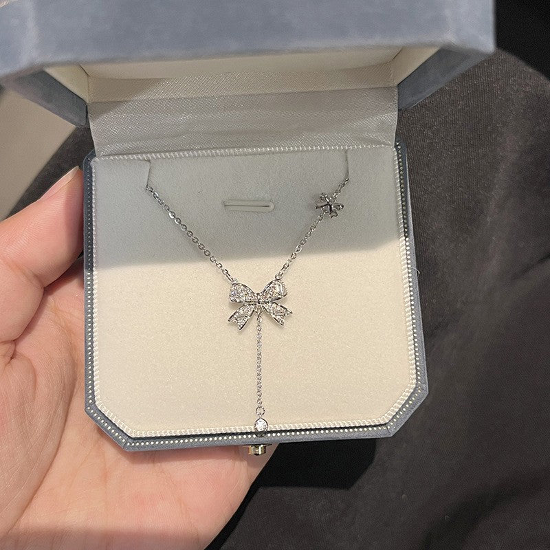 Wholesale Tassel bow necklace  light luxury titanium steel clavicle chain