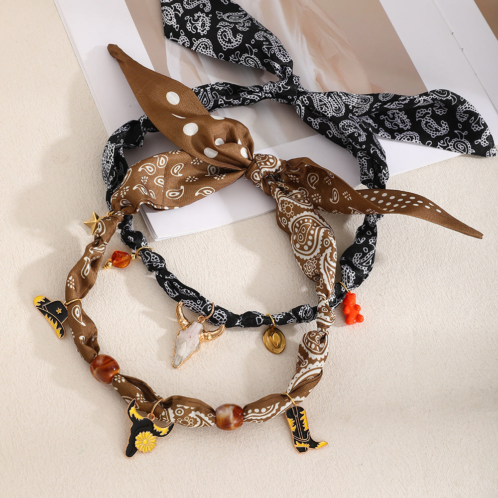 Wholesale alloy dripping Western cowboy series printed fabric necklace