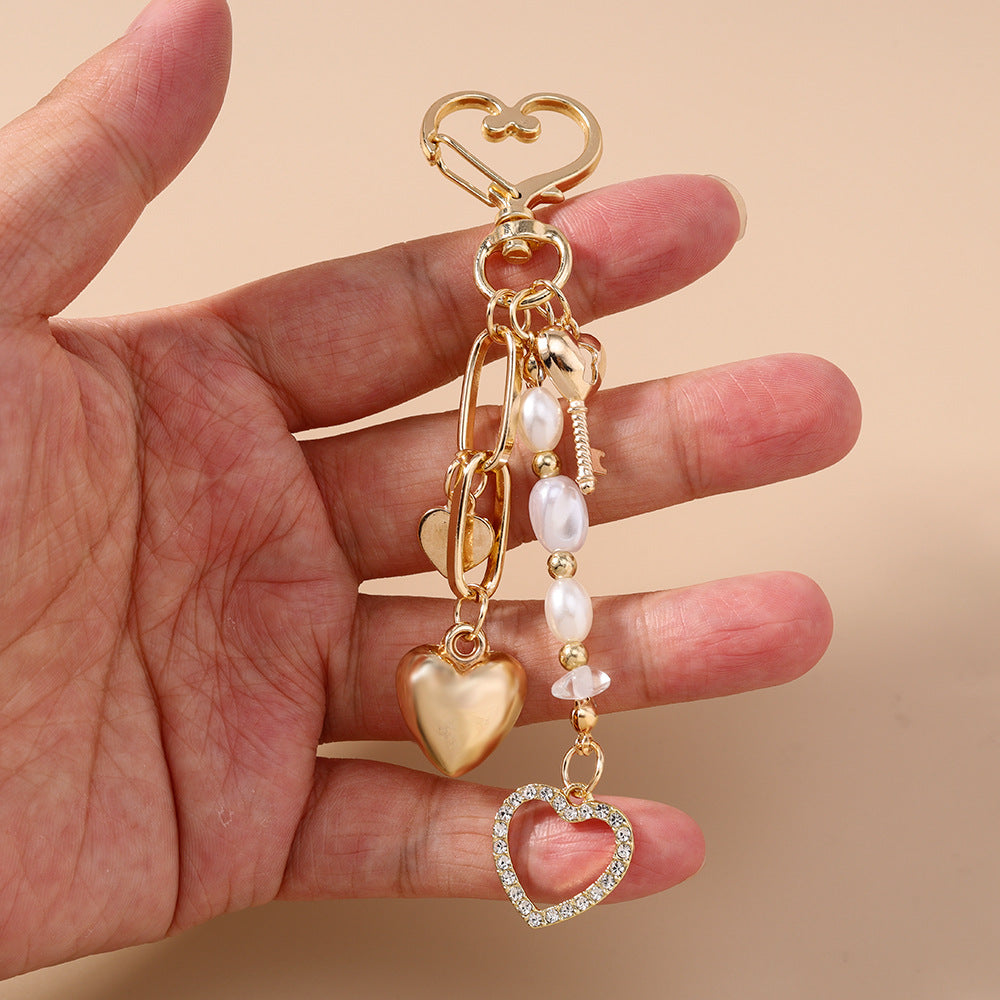 Wholesale Alloy Moon Star Star Pearl Beaded Heart Keychain