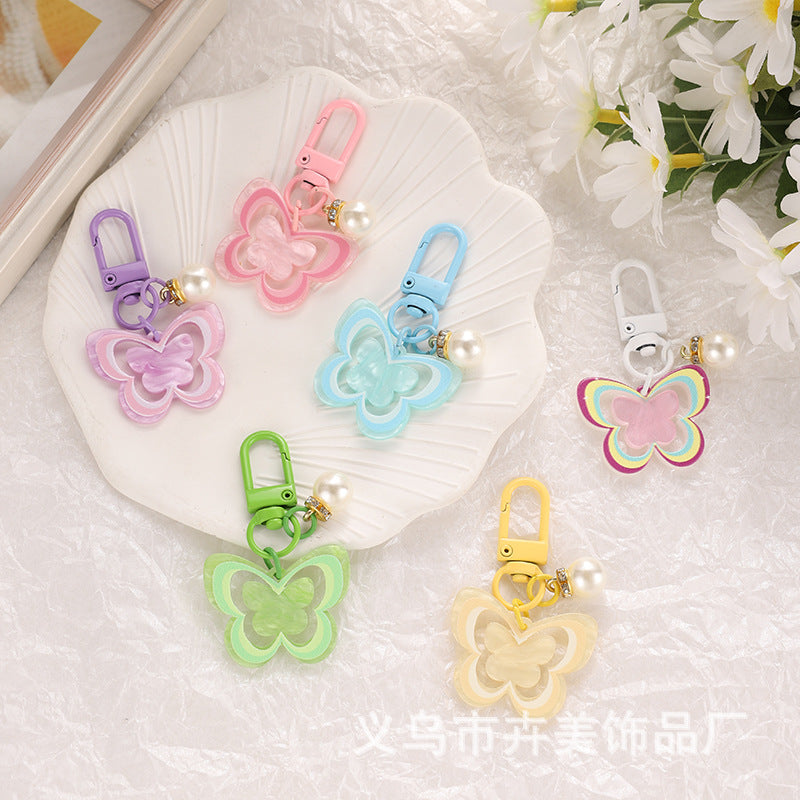 Wholesale Acrylic colorful hollow butterfly pearl pendant keychain