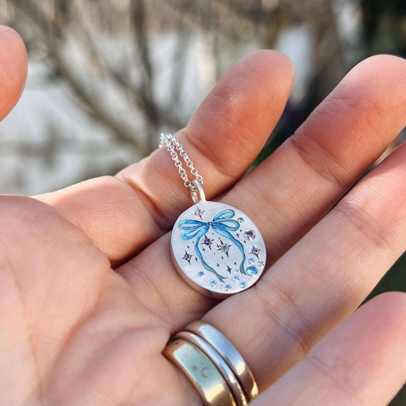 Wholesale Titanium Steel Bow Painted Oil Dropping Rabbit Element Pet Oval Tarot Necklace