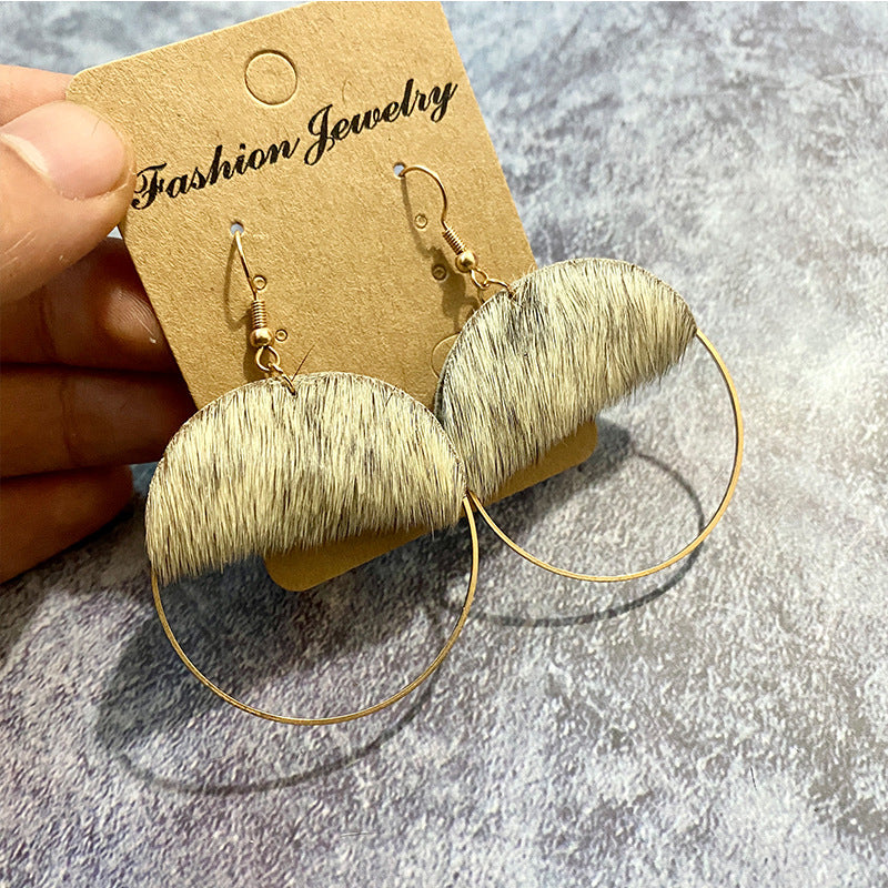 Pendientes de cuero genuino al por mayor Pendientes occidentales