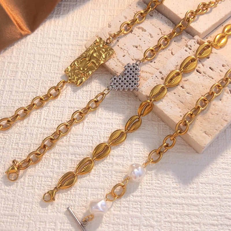 Wholesale Stainless steel bracelet with 18K gold plating,  geometric square and heart shape.