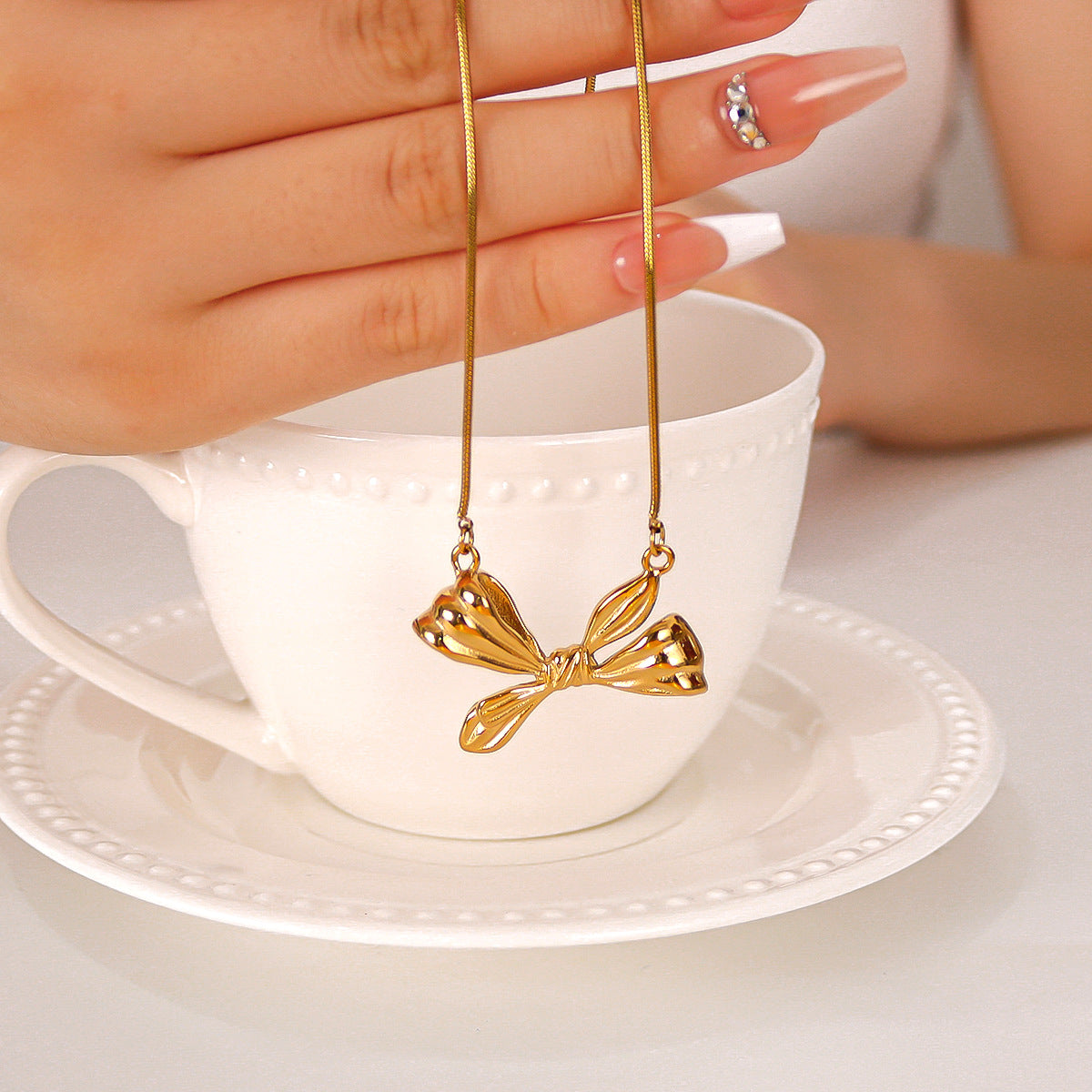 Wholesale stainless steel 18K gold plated bow necklace
