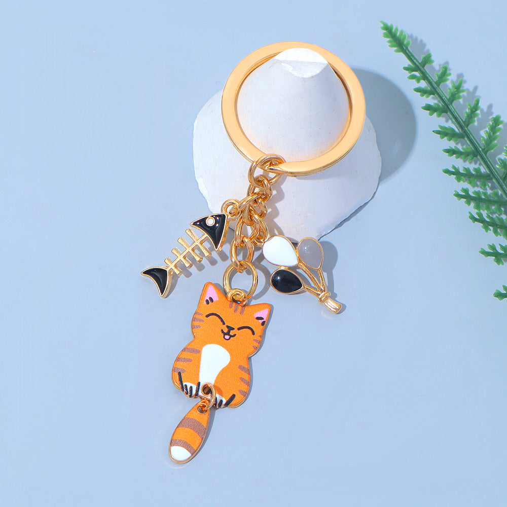 Wholesale Zinc Alloy Cartoon Cat Keychain With Movable Tail Trendy Animal Design Bag Charm Or Car Key Accessory Electroplated Finish Fashion Accessory For Gift And Boutique Resale