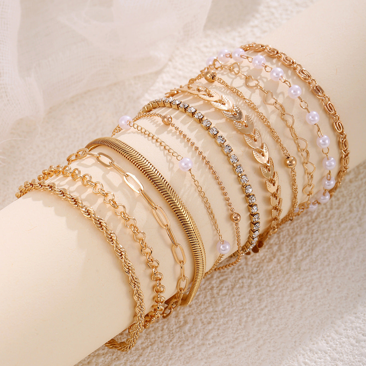 Wholesale Gold Tone 12 Piece Bracelet Set With Airplane Pearl Heart Designs Trendy Resale Jewelry Accessory