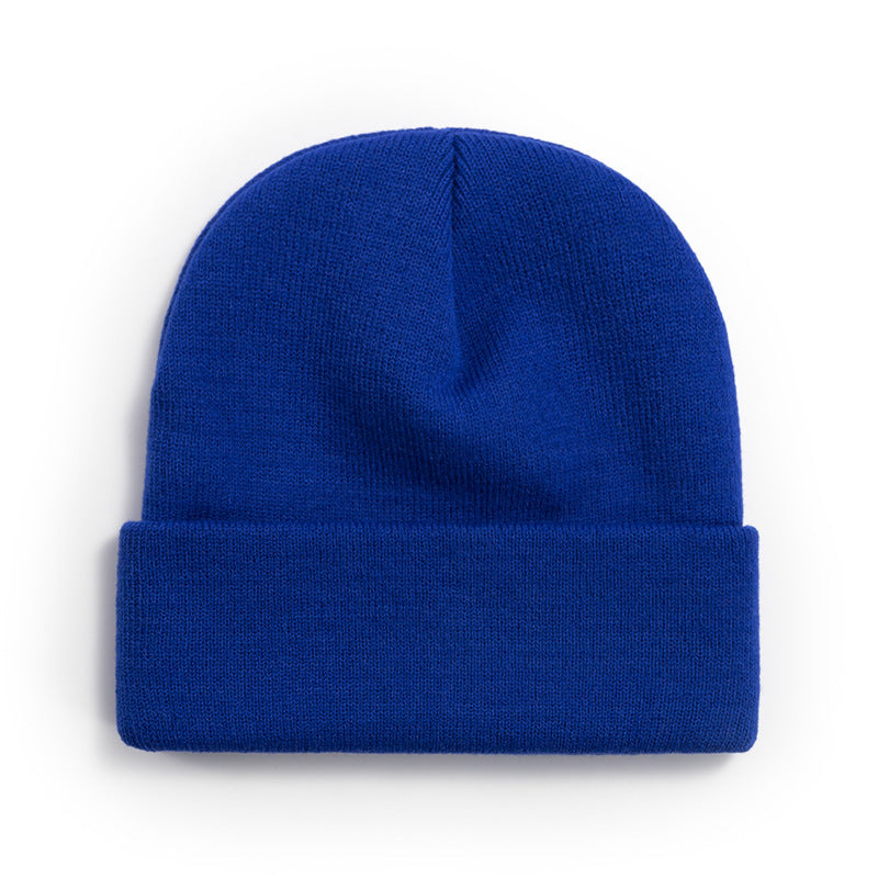 Wholesale light plate knitted cold cap acrylic solid color wool cap