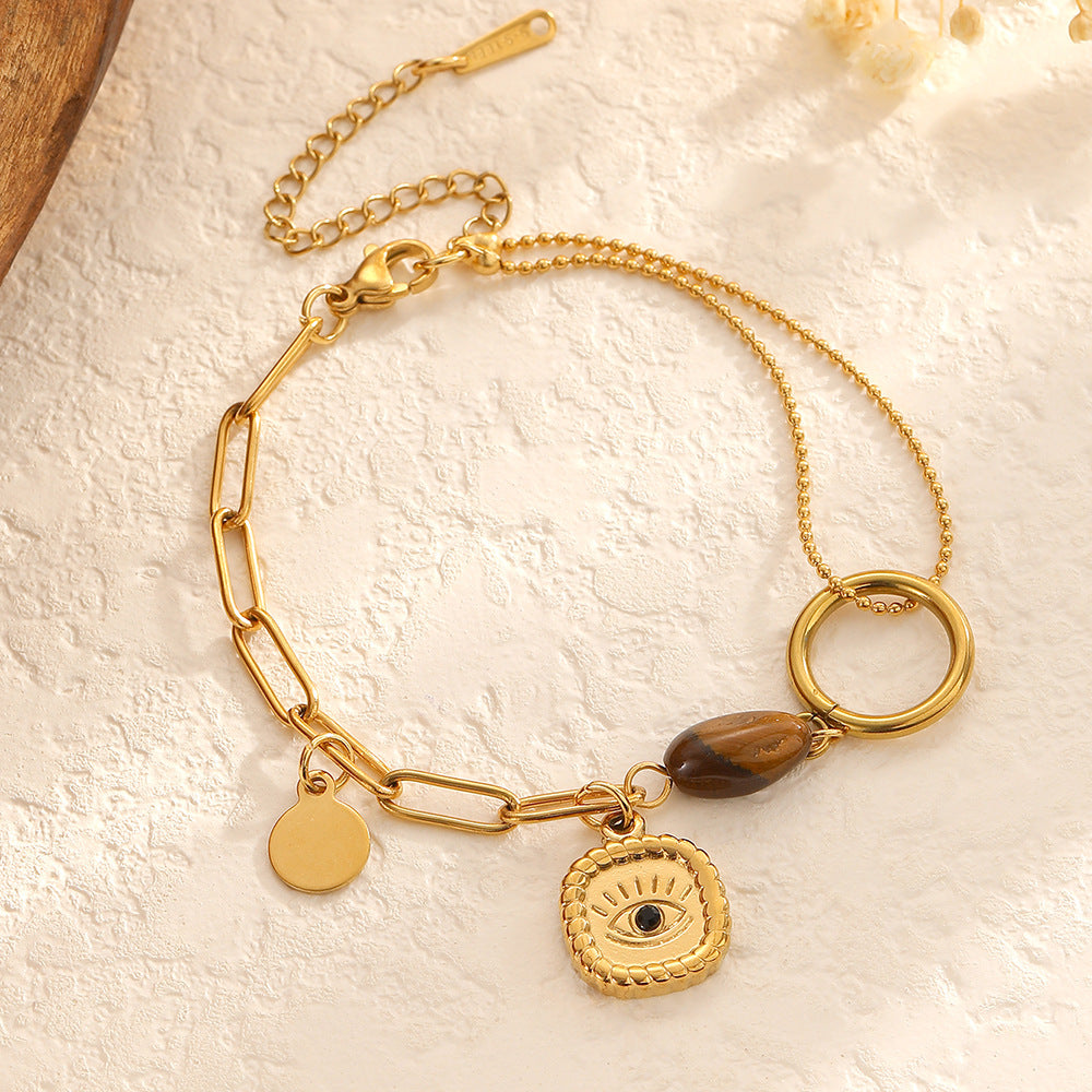 Wholesale Stainless steel cross and evil eye pendant with heart-shaped bracelet