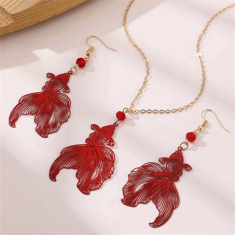 Wholesale  Retro Ball Hollow Goldfish  Design Earrings