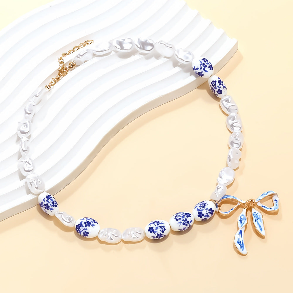 Wholesale Light Luxury Handmade Splicing  Pearl Oil Dripping Bow Pendant Necklace