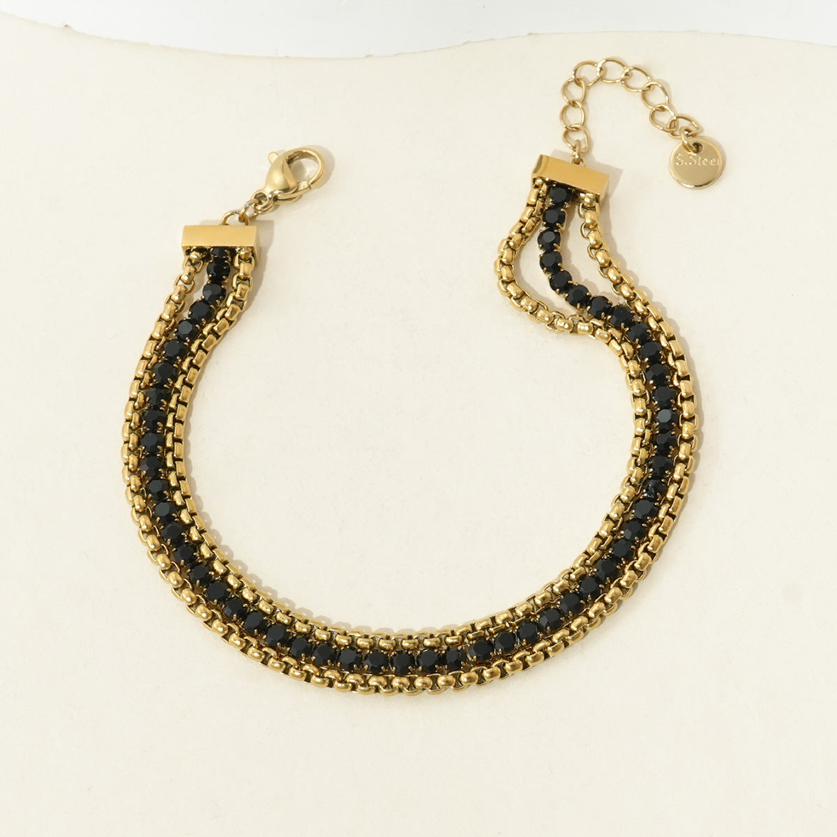 Wholesale Stainless steel bracelet with multiple layers and diamond embellishments.