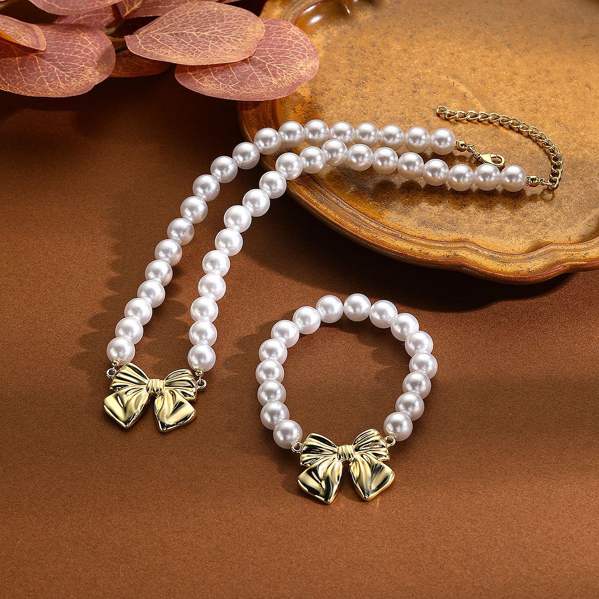 Wholesale Alloy Bow Pearl Necklace ACC-NE-ManYi018