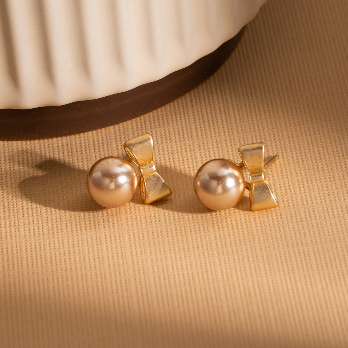 Wholesale Silver Needle Bow Pearl Earrings
