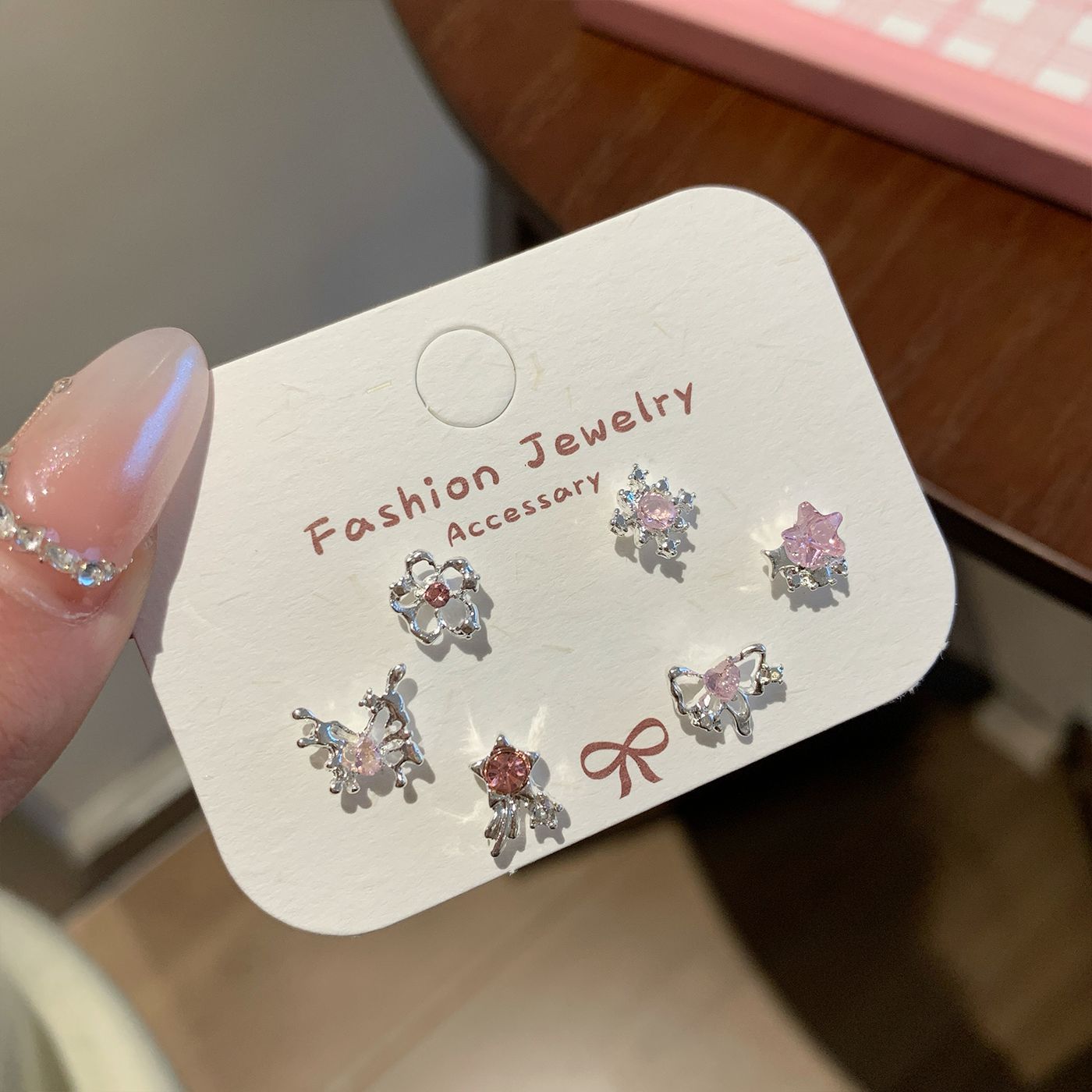 Wholesale Sweet and cool pink zircon butterfly earrings silver needle small daily sparkling all-match earrings