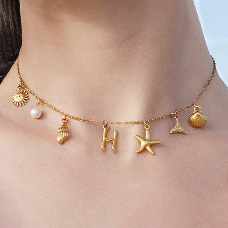 Wholesale Bohemian Shell Starfish Gold Electroplated Copper Alphabet Pendant Necklace for Women Fashion Accessory