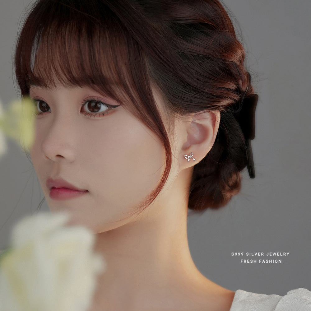 Wholesale s999 Foot Silver Bow Earrings