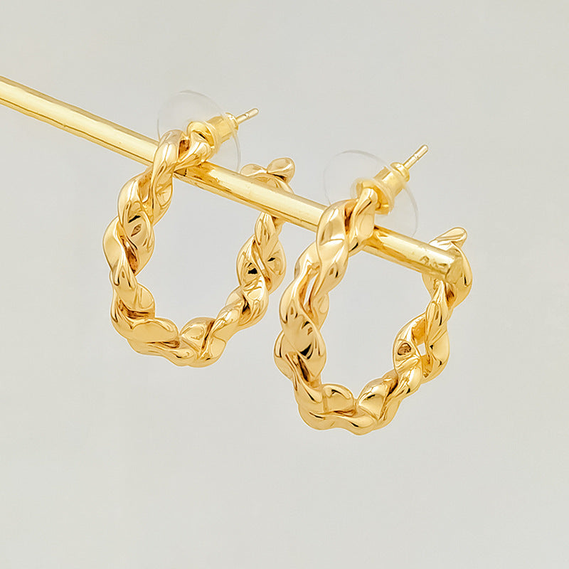 Wholesale twist earrings plain ring light luxury copper plated gold earrings