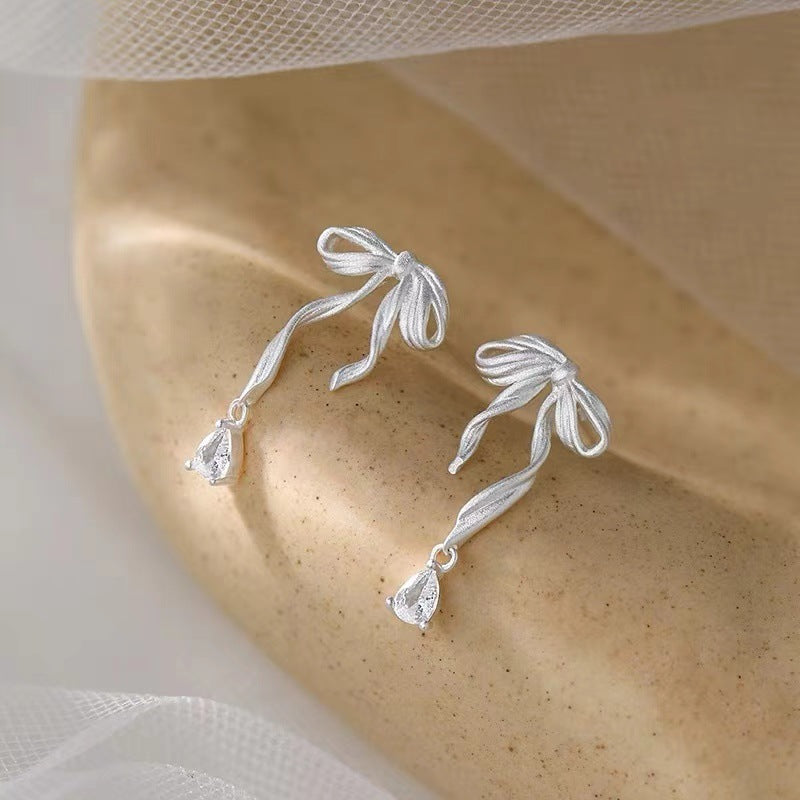 Wholesale 925 silver needle bow earrings