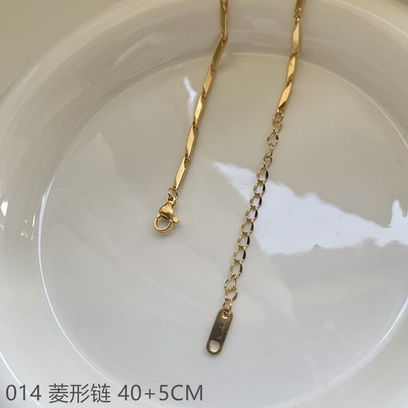 Wholesale Cross chain box chain snake bone chain titanium steel plated 24k golden sunflower clavicle chain