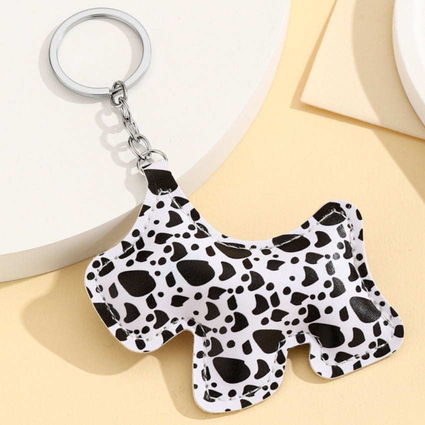 Wholesale New keychain pendant PU cotton-filled leopard print puppy car pendant bag pendant new couple heart pendant.