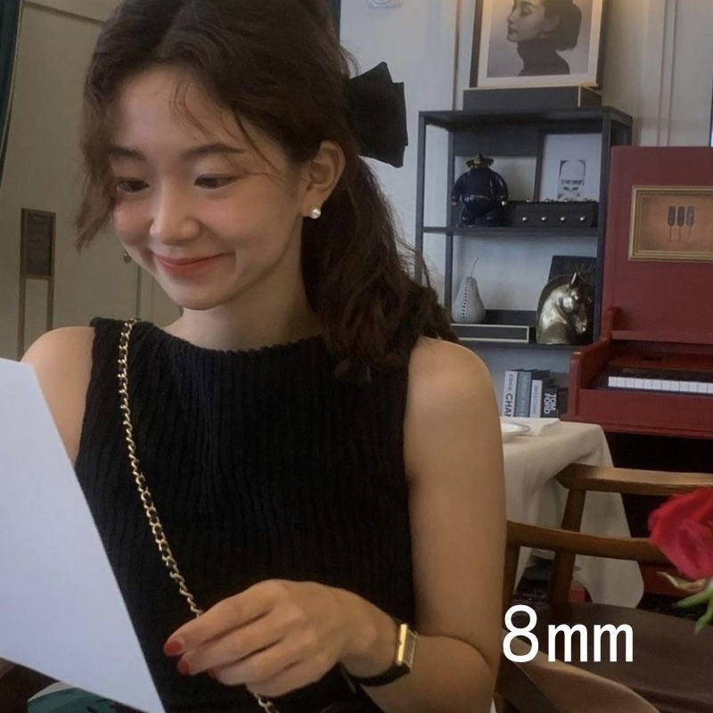 Wholesale big round pearl hollow mosquito coil ear clip earrings