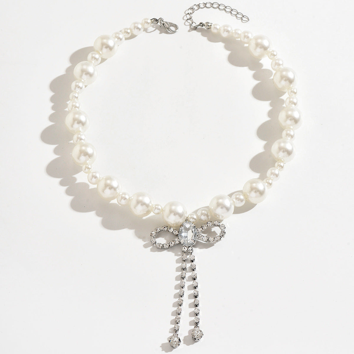 Wholesale Imitation Pearl Bow Tie Rhinestone Tassel Choker Necklace Fashion Accessory Boutique Resale