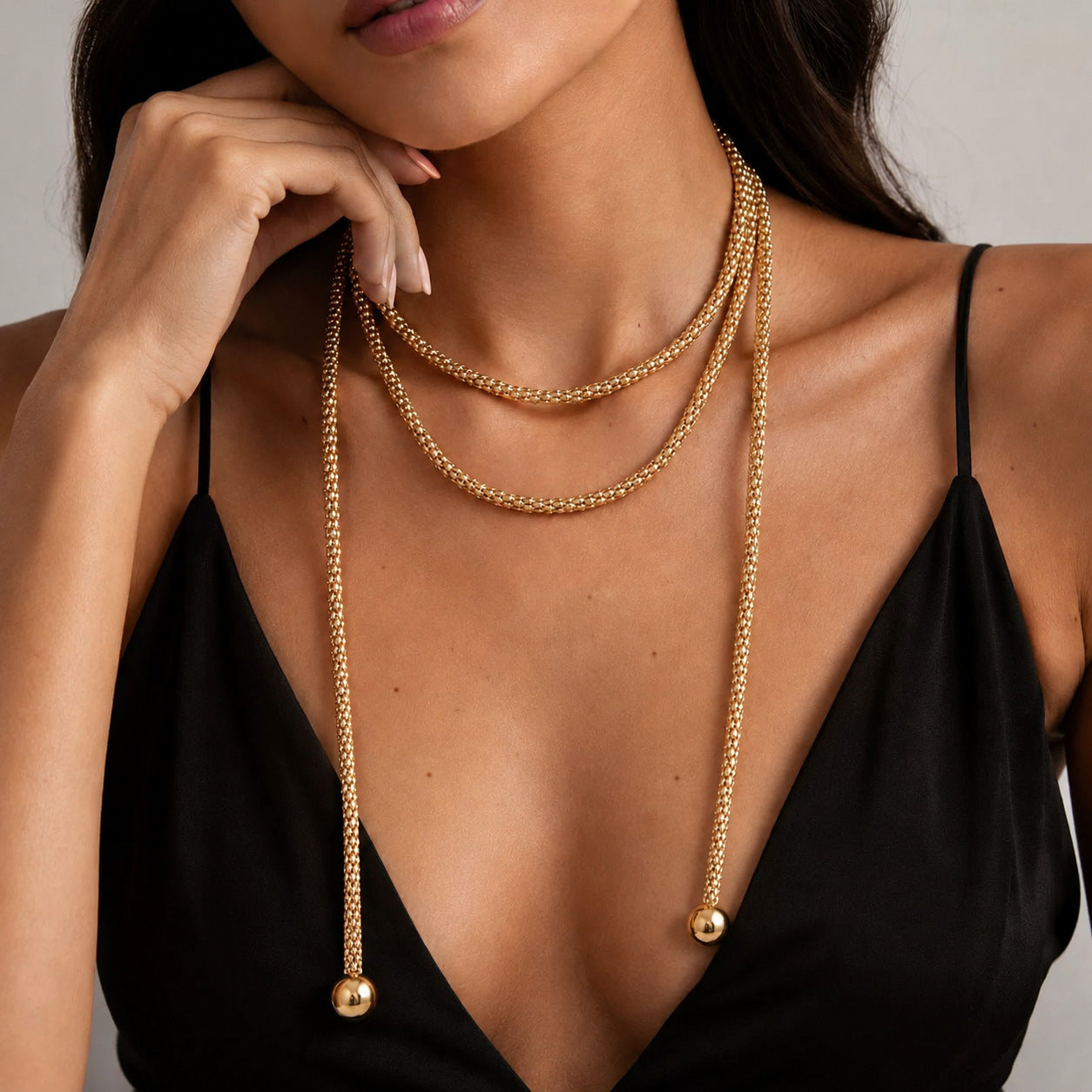 Wholesale Trendy Rope Knot Long Necklace Shiny Gold Ball Pendant Layering Jewelry Accessory For Boutique Resale
