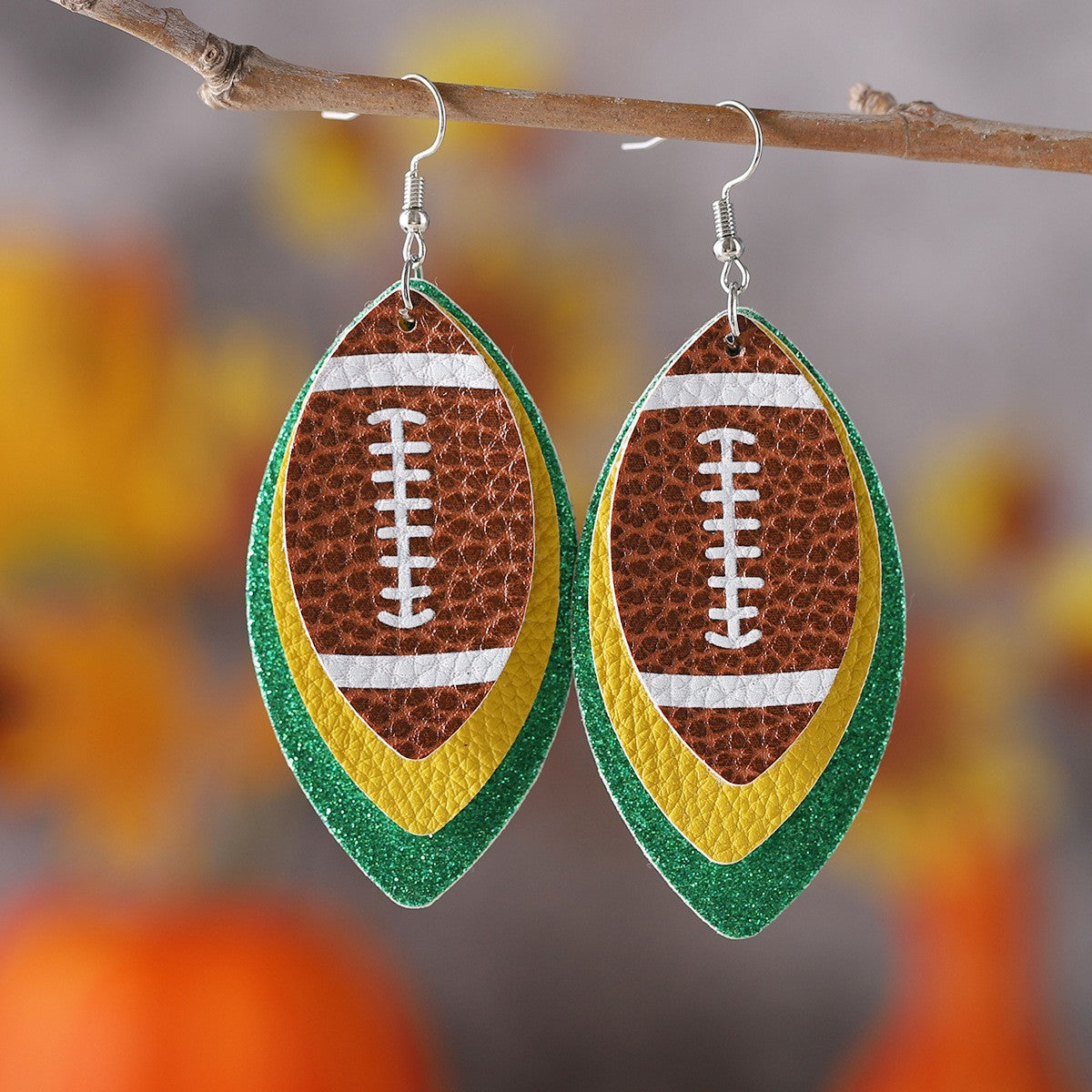 Wholesale Teardrop-shaped football acrylic leather earrings