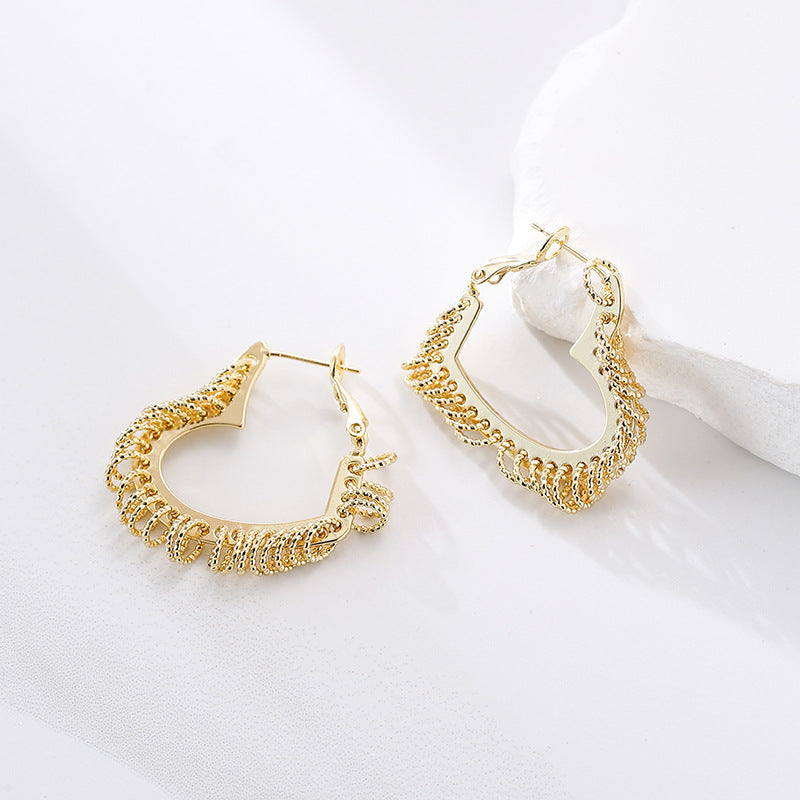 Wholesale copper plated gold inlaid zircon love earrings