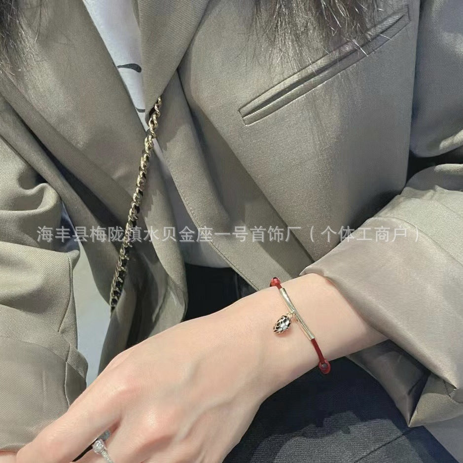 Wholesale V Gold Snakehead Hand Rope Gum Dropping Emerald Bracelet