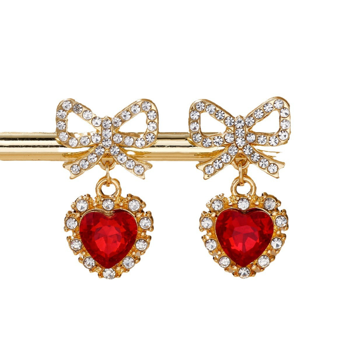 Wholesale Zinc alloy heart-shaped bow earrings with rhinestones