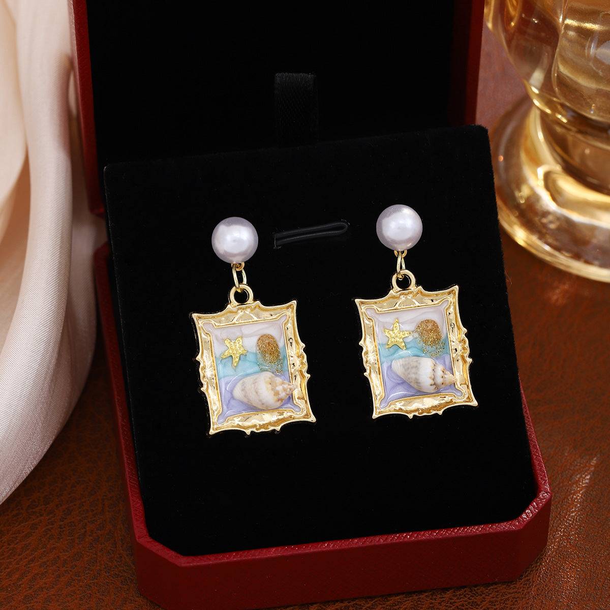 Wholesale Oil Dropping Three-dimensional Conch Pearl Flower Earrings