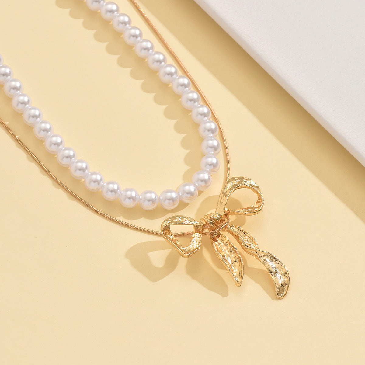 Wholesale three-dimensional bow pendant necklace