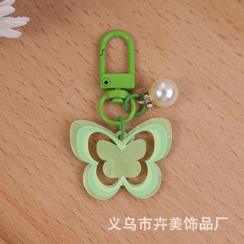 Wholesale Acrylic colorful hollow butterfly pearl pendant keychain