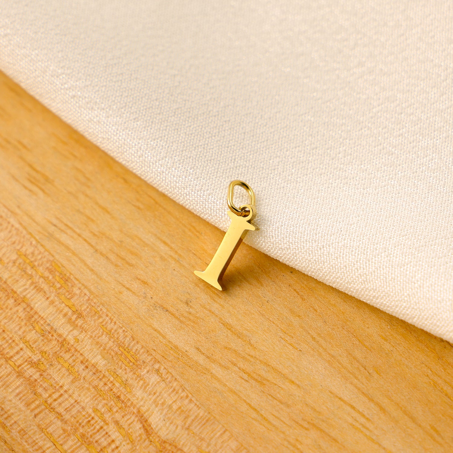 Wholesale Titanium steel letter pendant