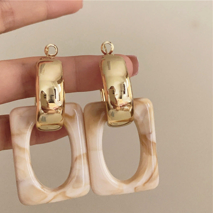 Wholesale retro hollow geometric acrylic silver needle light luxury earrings