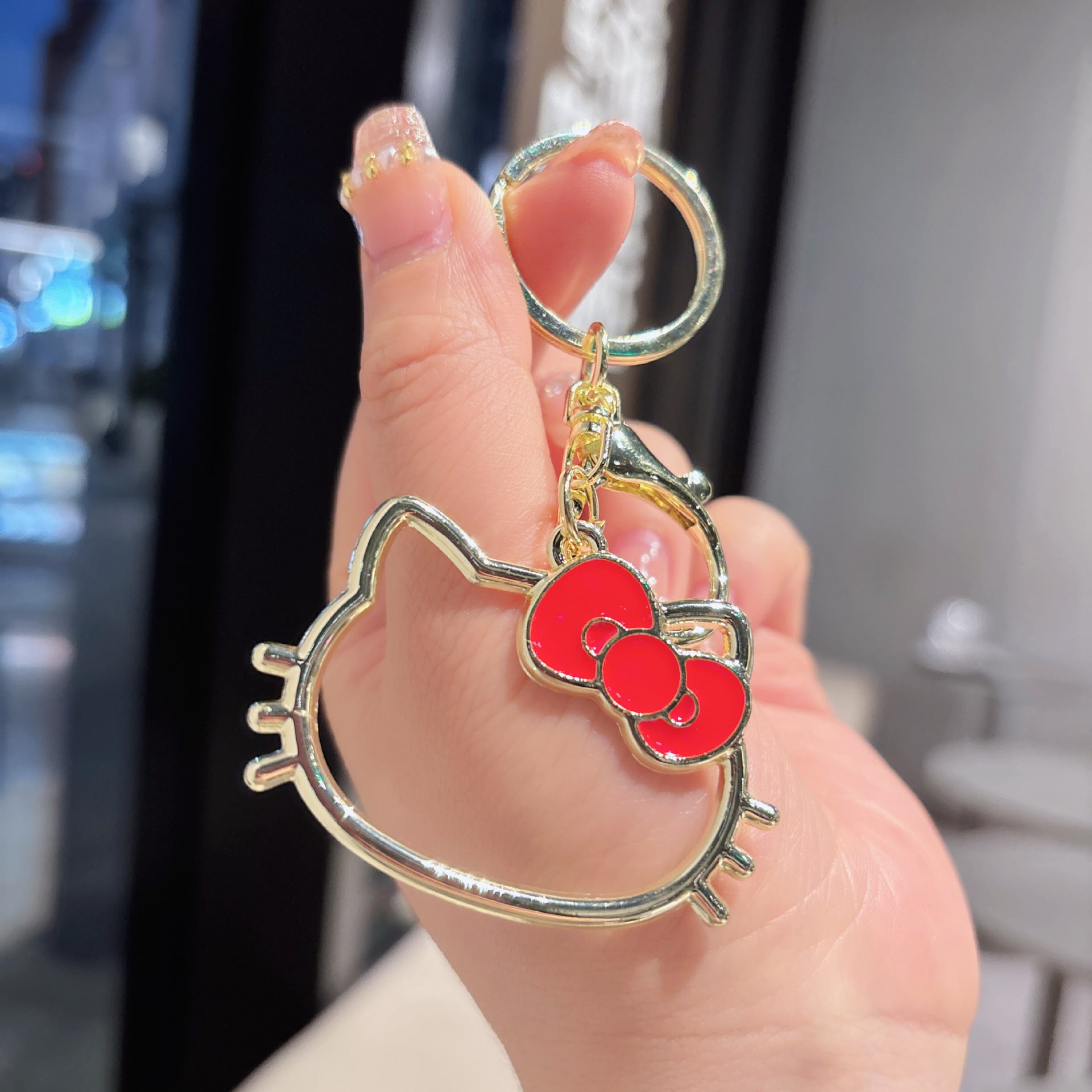 Wholesale hollow paint KT cat alloy key chain cute cartoon girl bag decoration