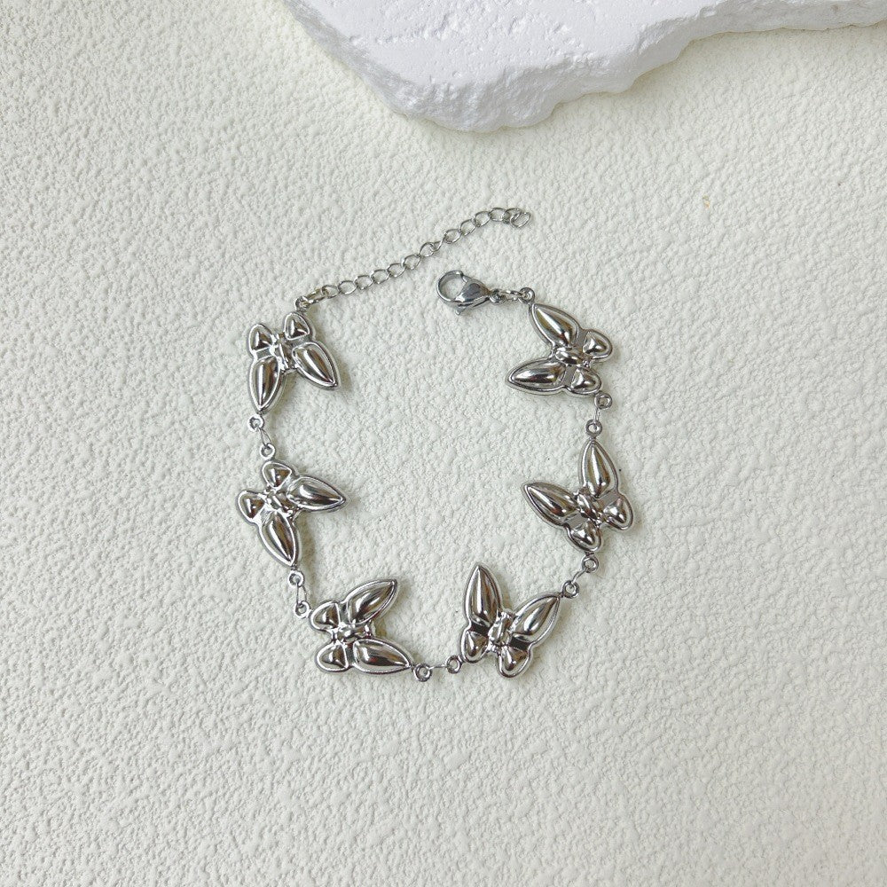 Wholesale  stainless steel three-dimensional hollow butterfly bracelet necklace suit