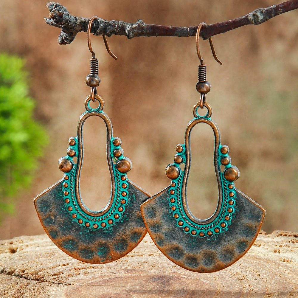 Wholesale Retro Bohemian Turquoise Heart Hollow Leaves Alloy Earrings for Party Wear Boutique Resale Jewelry