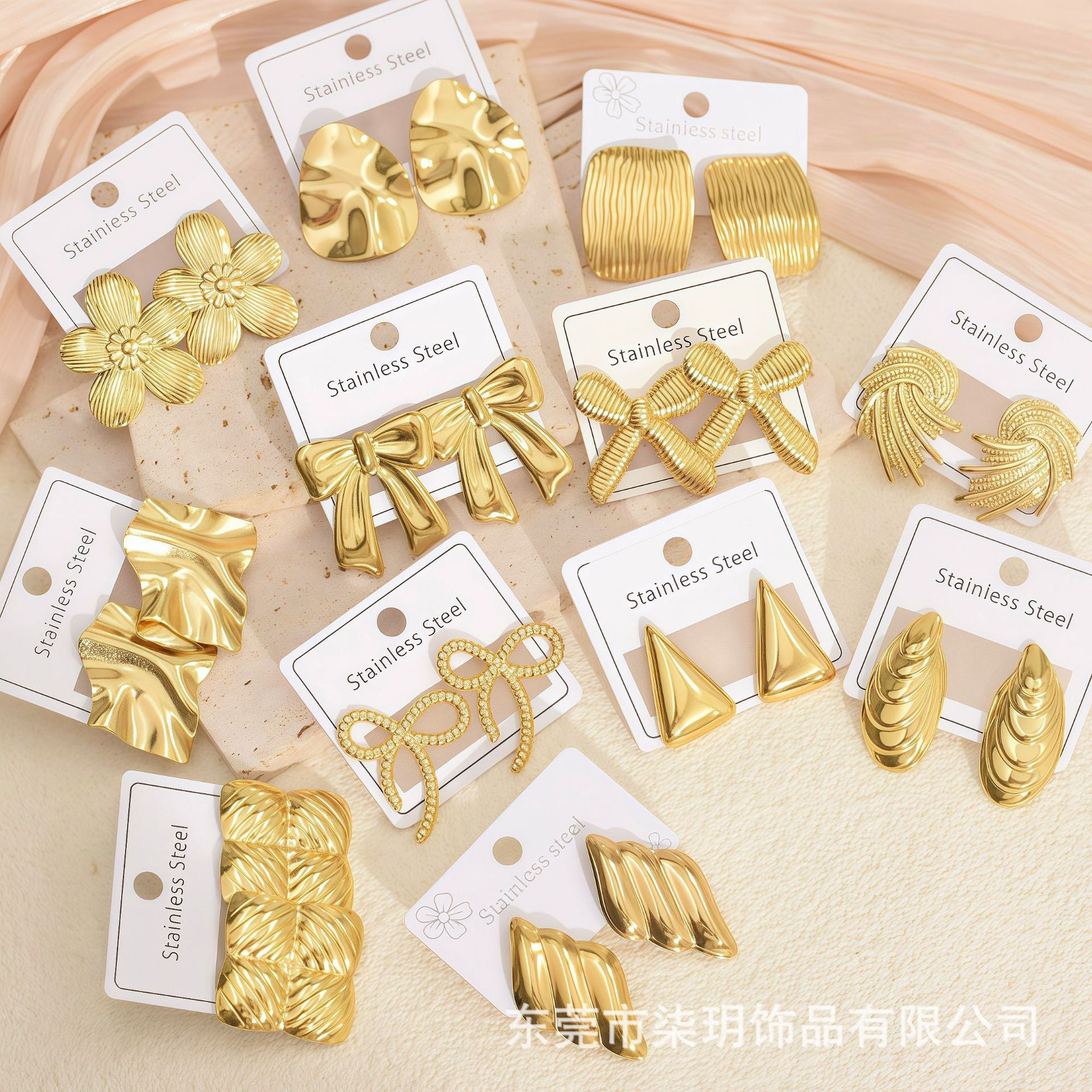 Wholesale Stainless Steel Unique Bow Irregular Stud Earrings
