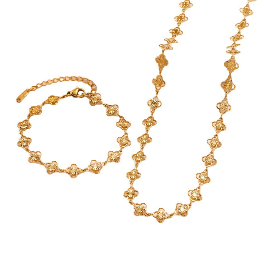 Wholesale Openwork floral four-leaf clover bracelet and necklace