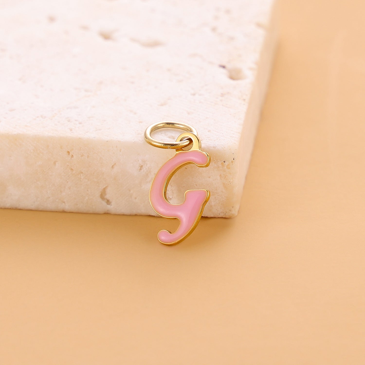 Wholesale Colorful 26 English letter pendant oil drop titanium steel vacuum plating pendant