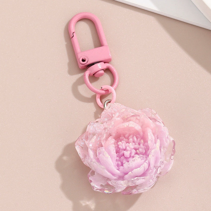 Wholesale colorful glittery camellia keychain