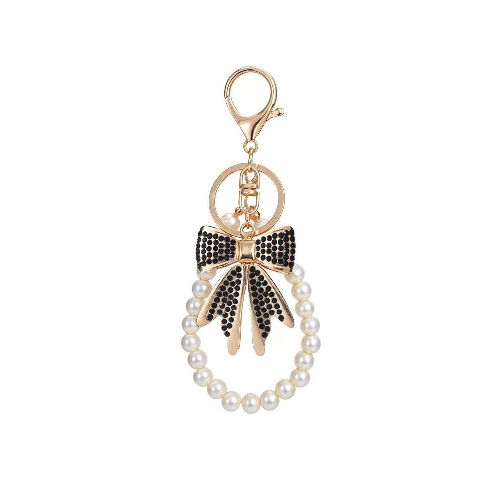 Wholesale Black Zinc Alloy Handmade Cute Korean Style Bow Rhinestone Pearl Bead Car Keychain Phone Chain Bag Charm Gift