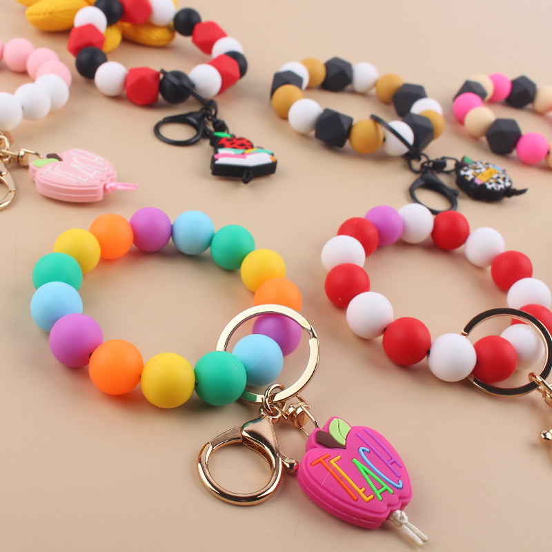 Wholesale Cartoon Apple Teacher Pencil Silicone Beaded Wrist Keychain