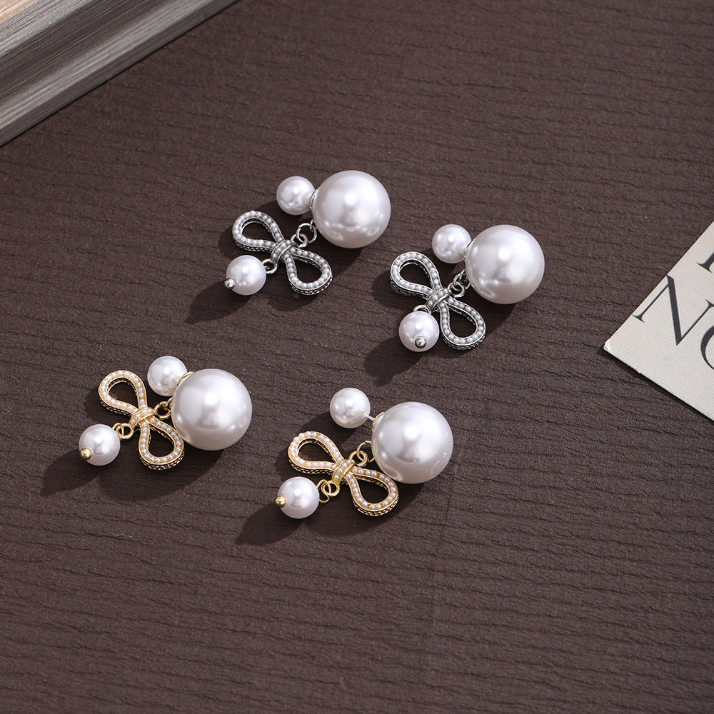 Wholesale Pearl bow pendant stud earrings