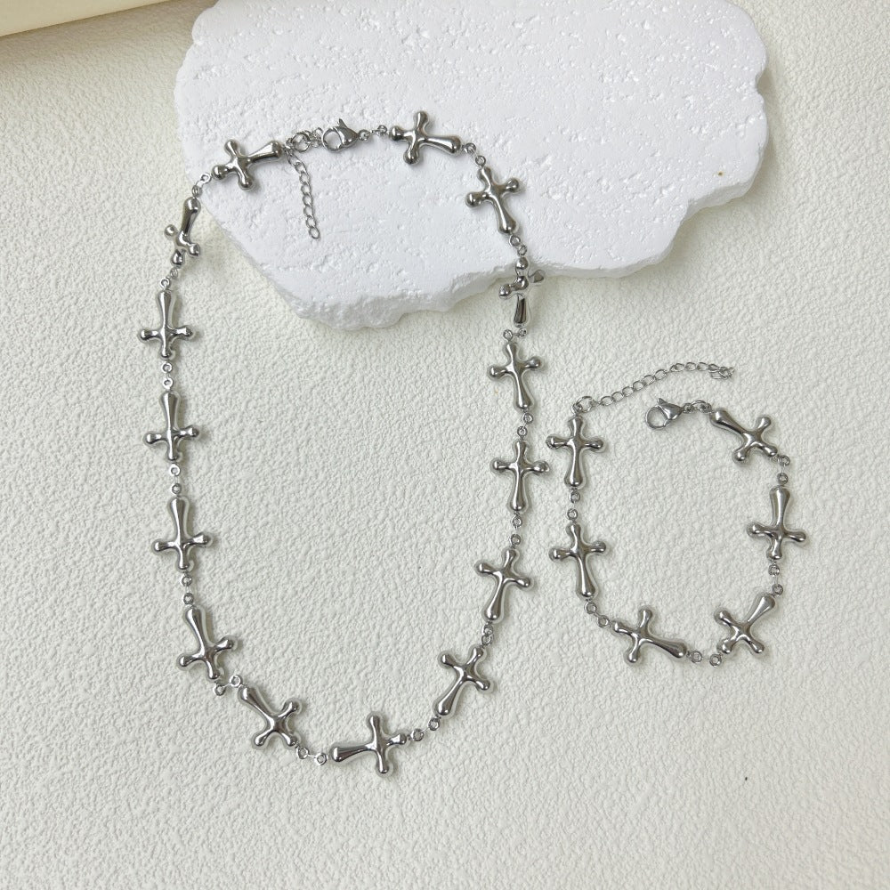 Wholesale  light luxury stainless steel three-dimensional hollow cross bracelet necklace suit