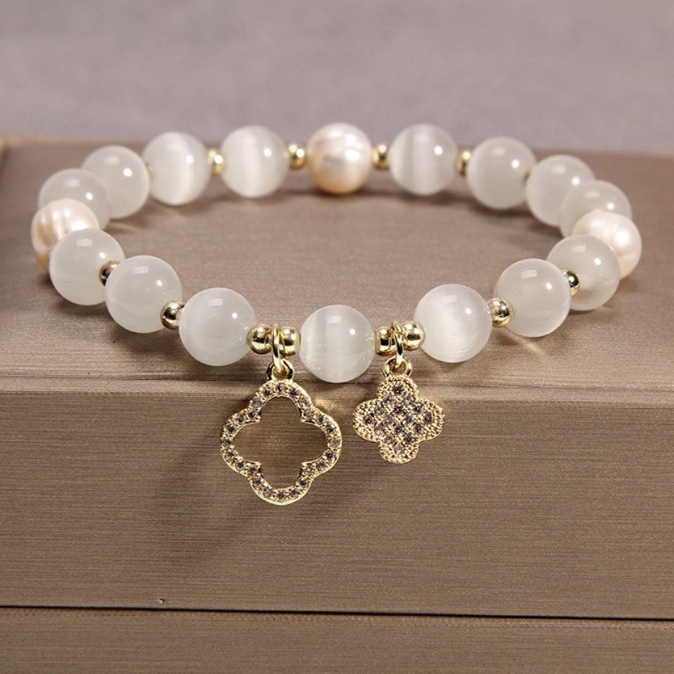 Wholesale Four Leaf Clover Imitation Cat S Eye Glass Pearl Bracelet Women S Everyday Wear Boutique Resale Jewelry Accessory