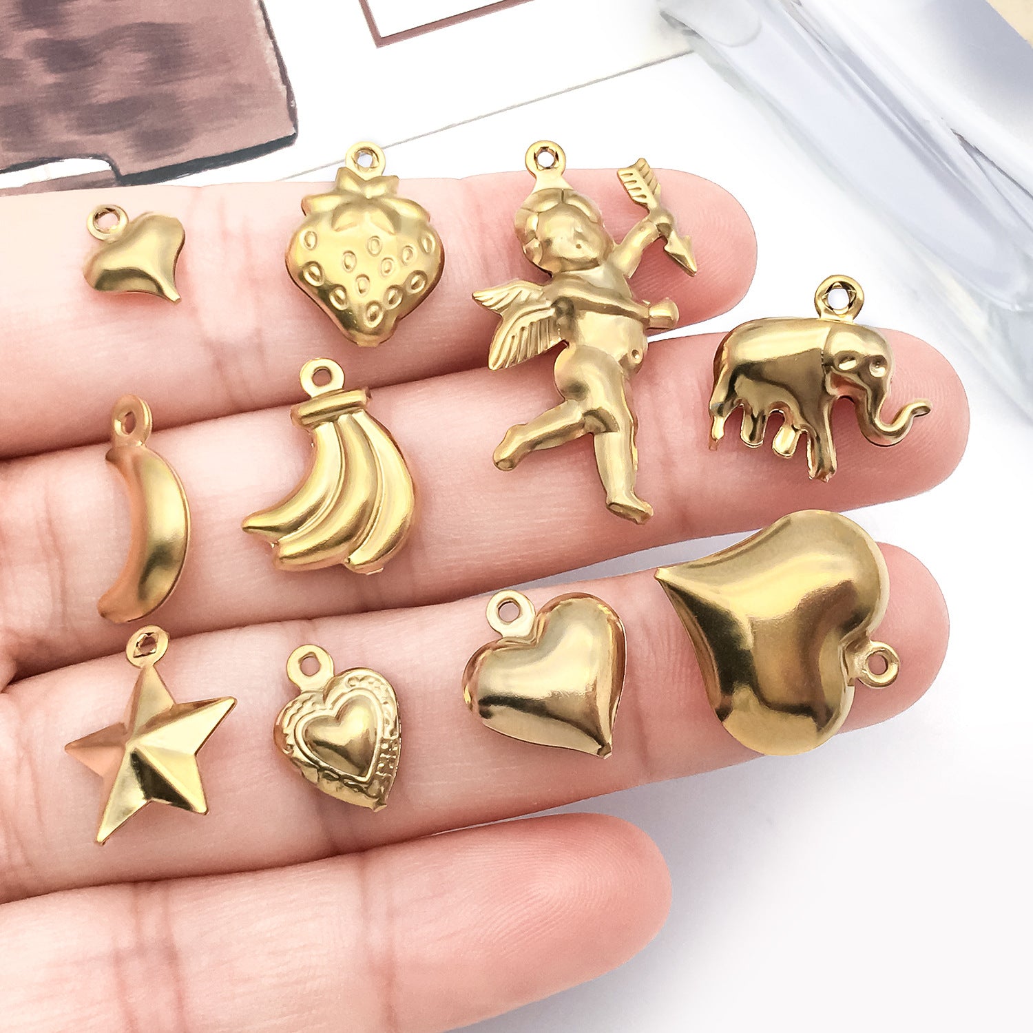 Wholesale Stainless steel vacuum plated hollow angel heart fruit  Charms