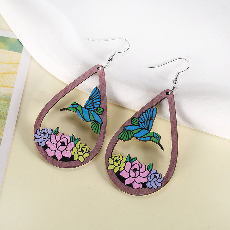 Wholesale hollow water drop bird flower earrings